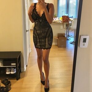 bebe Hemmed Black & Nude Lace Bodycon
Mini Dress